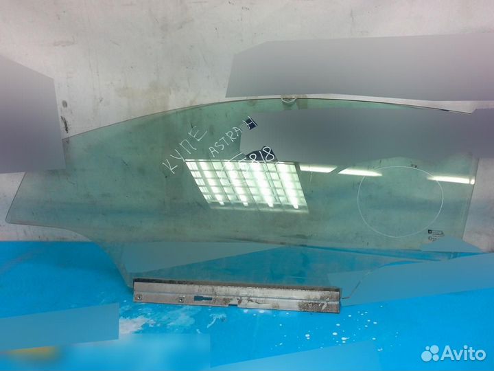 Стекло двери передней левой Opel Astra H Family 20