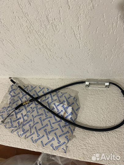 Трос ручника задний правый диск. Kia Spectra 01