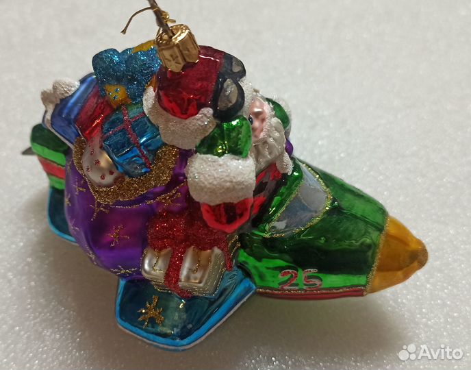 Елочная игрушка Санта Клаус на самолете impuls