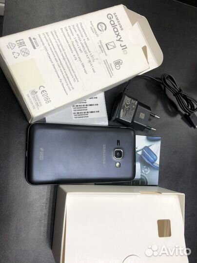 Телефон Samsung J120