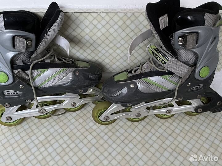 Роликовые коньки