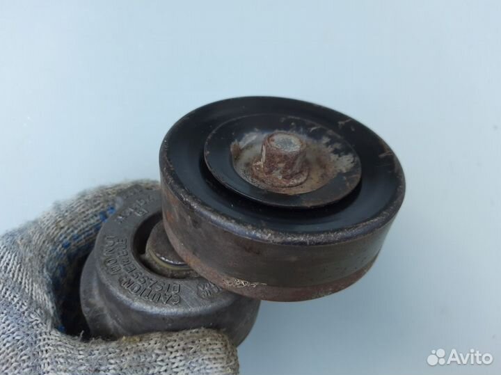 Натяжитель ремня Dodge Caravan 2