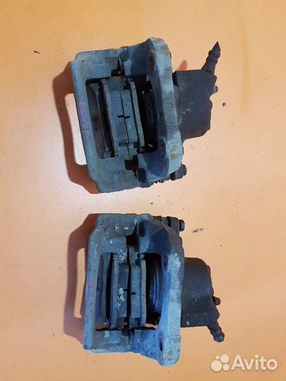 Суппорт тормозной передний на Renault Logan