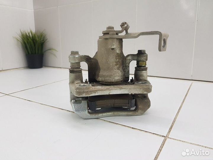 Суппорт задний правый (Kia Seltos)