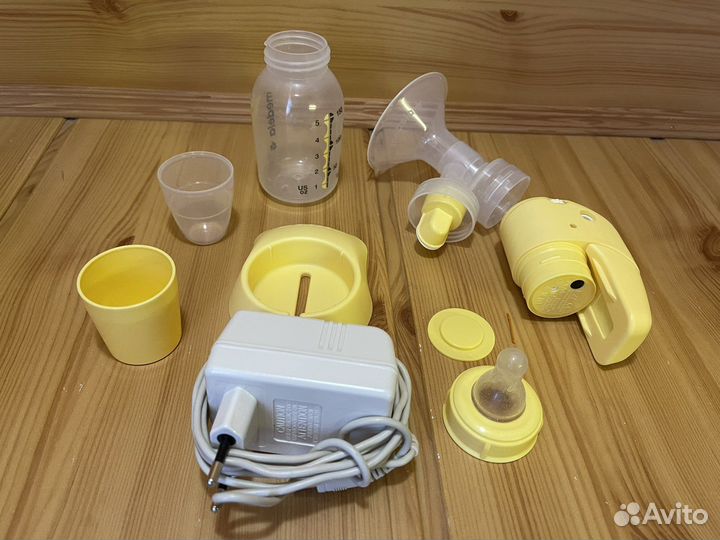 Молокоотсос medela электрический