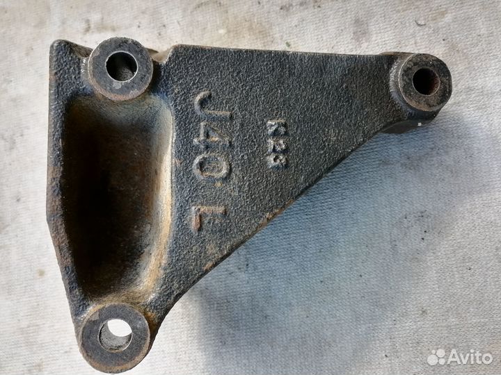 Кронштейн генератора Nissan Almera N15 1995-2000