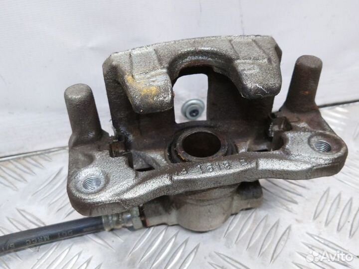 Суппорт задний левый Mitsubishi Lancer 10