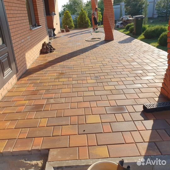 Укладка тротуарной плитки брусчатки