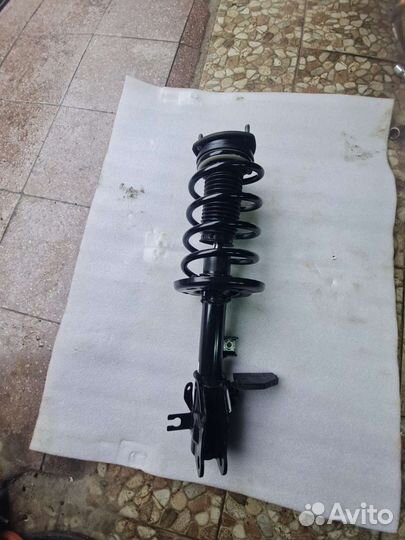 Стойка амортизатора Mazda сх 9 (2) 2018-2022г