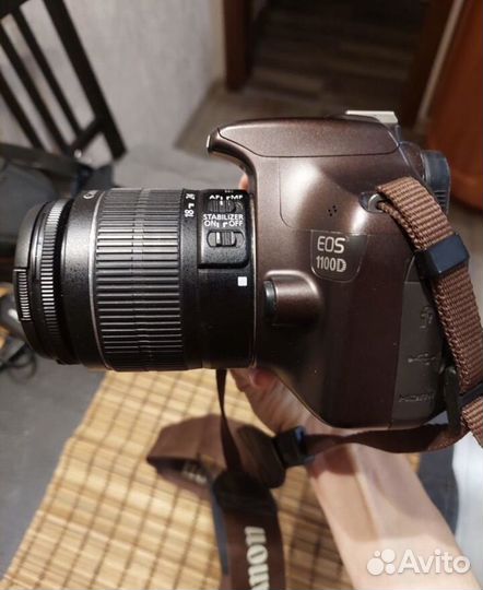 Зеркальный фотоаппарат Canon 1100d коричневый