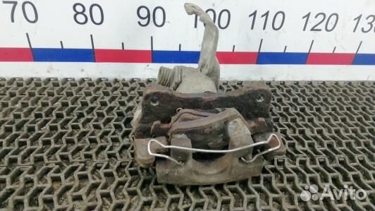 Суппорт тормозной задний правый nissan primera P12