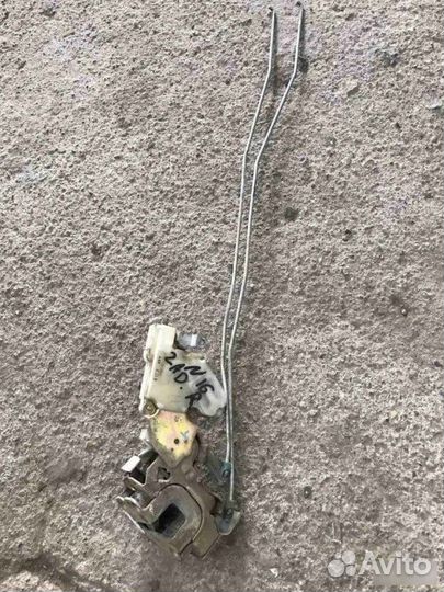 Замок двери задний правый Nissan Almera N16