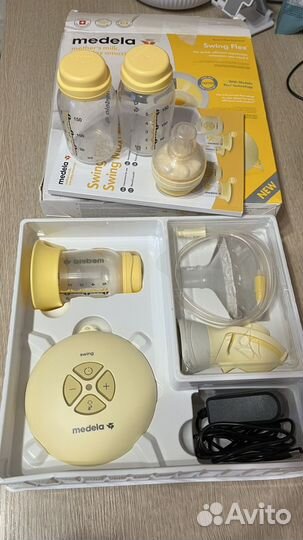 Молокоотсос medela электрический