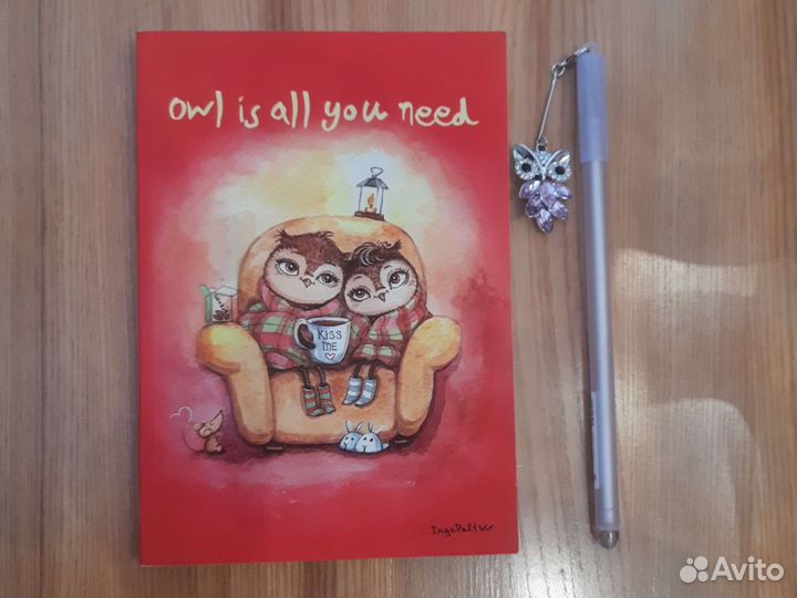 Блокнот с ручкой