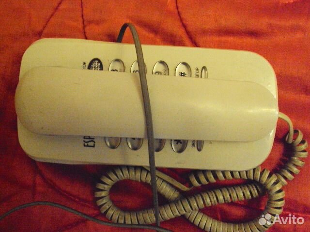 Телефон кнопочный