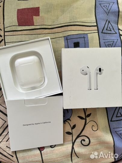 Беспроводные наушники airpods1