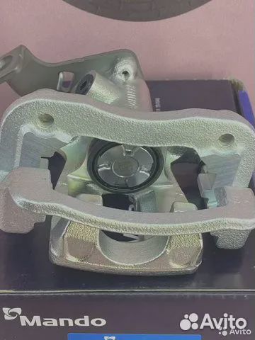 Тормозной суппорт задний правый Solaris Rio Mando