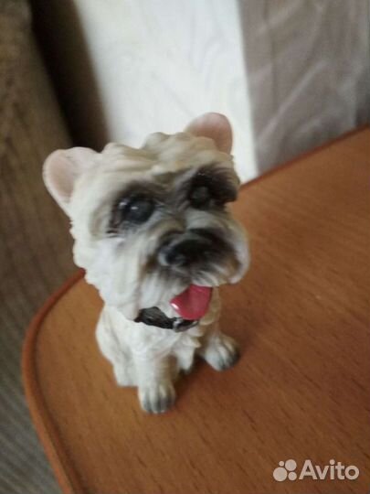 Собачки две,качающие головой пара