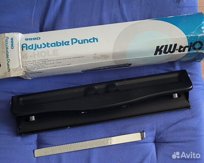 Дырокол на 4 отверстия