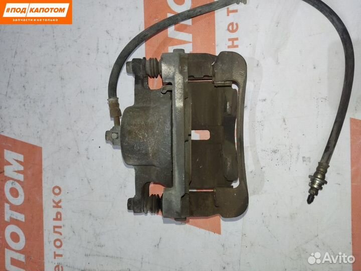 Суппорт тормозной передний правый Nissan X-Trail