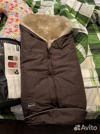 Меховой конверт в коляску