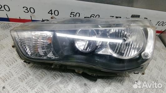 Фара левая mitsubishi outlander 2 (GEA09MR01)