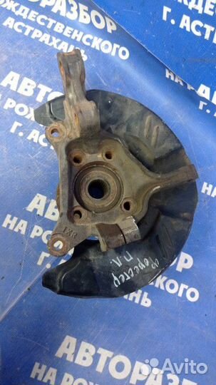 Передний левый поворотный кулак Subaru Forester