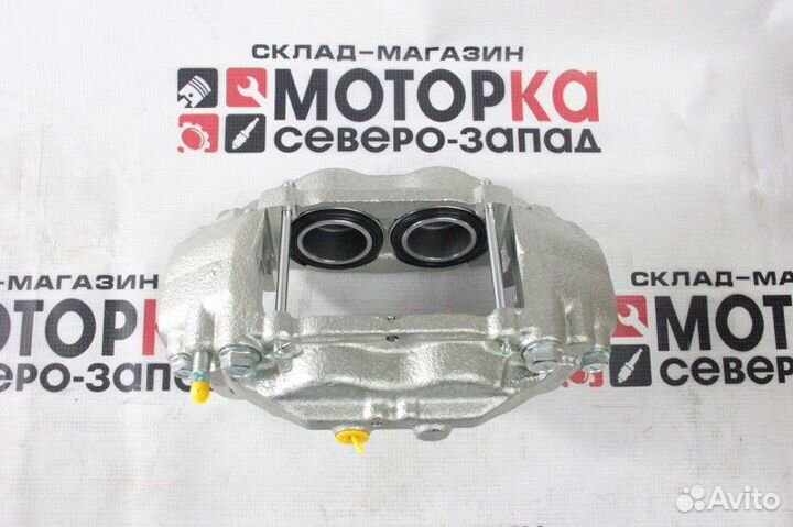 Суппорт тормозной передний правый Toyota Land