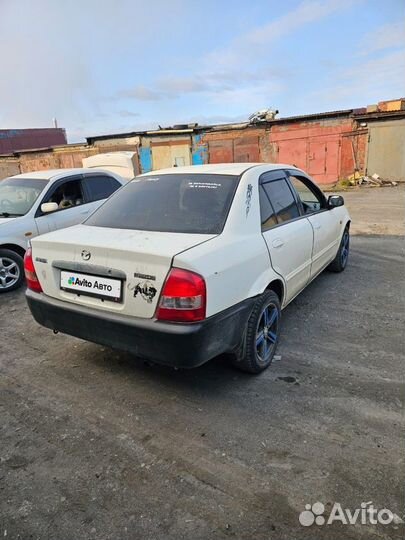 Mazda Familia 1.5 AT, 2002, 250 000 км