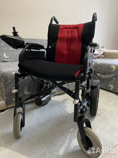 Электрическая инвалидная коляска