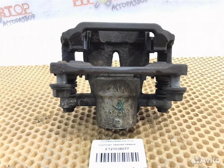 Суппорт задний левый Toyota Estima (AHR20,ACR50,A