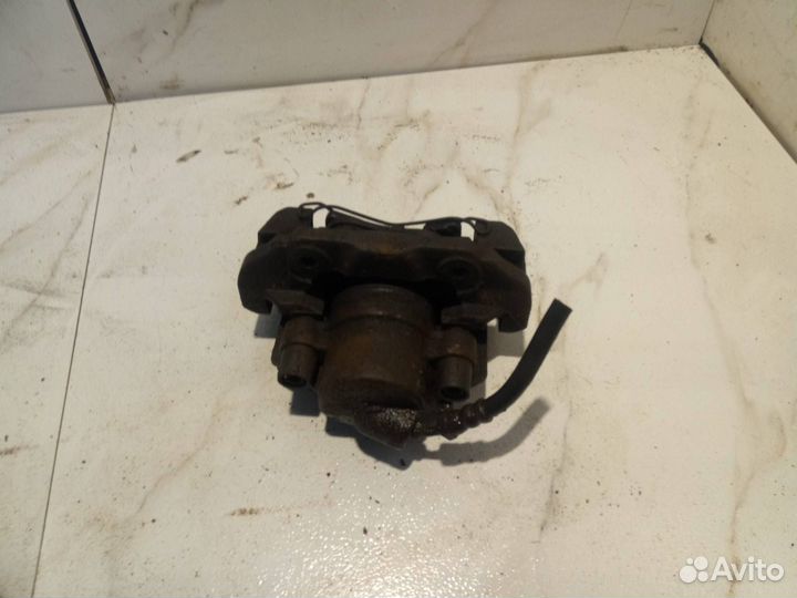 Суппорт тормозной передний левый Ford Fusion рест