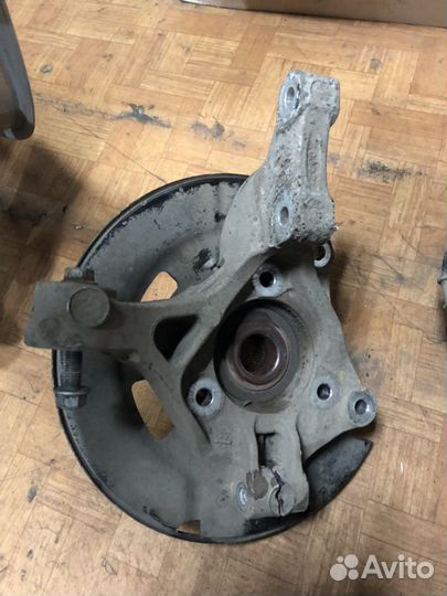 Кулак поворотный Опель Астра j