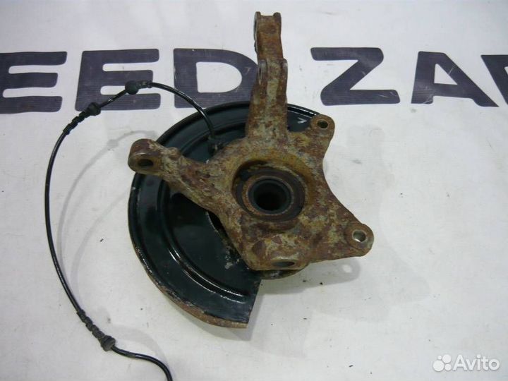 Поворотный кулак передний левый Renault Duster 1