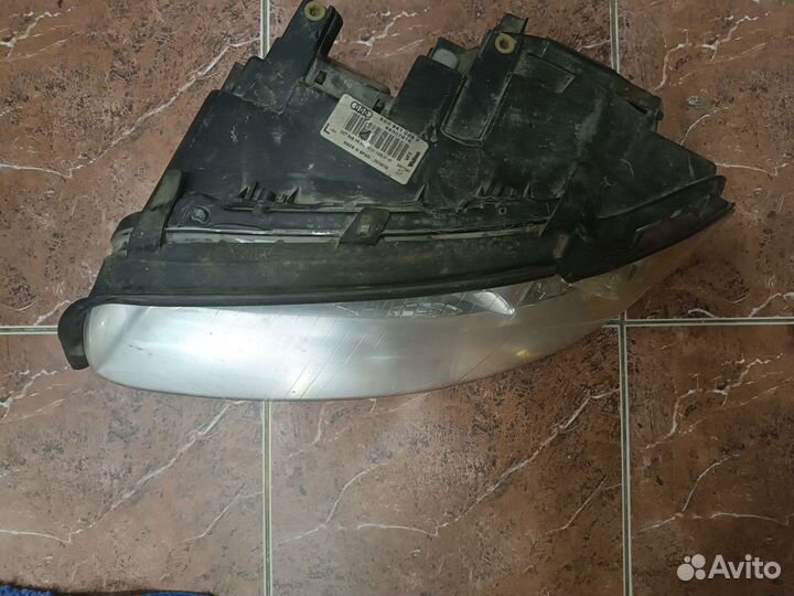 Фара левая audi a4 b6