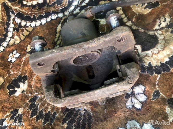 Суппорт на toyota funcargo NCP25 1NZ