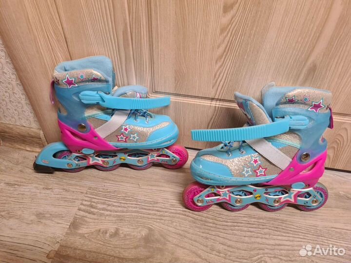 Роликовые коньки