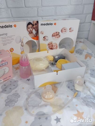 Молокоотсос medela swing электрический