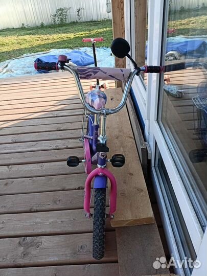 Четырех колёсный велосипед