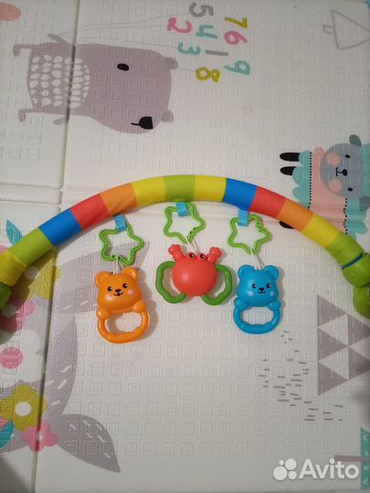 Дуга с игрушками в коляску или в кроватку