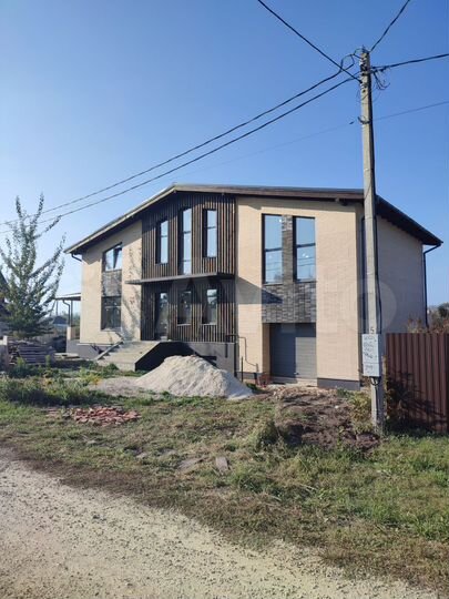 Коттедж 380 м² на участке 9 сот.