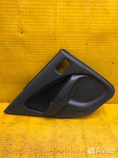 Обшивка двери задняя левая Nissan Almera Classic