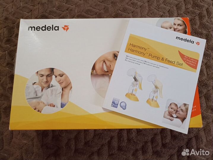 Молокоотсос medela ручной+ соска calma