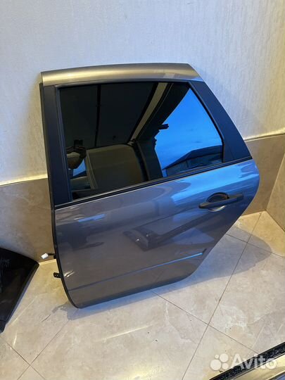 Задняя левая дверь на гранту лифтбек фл 2019 год