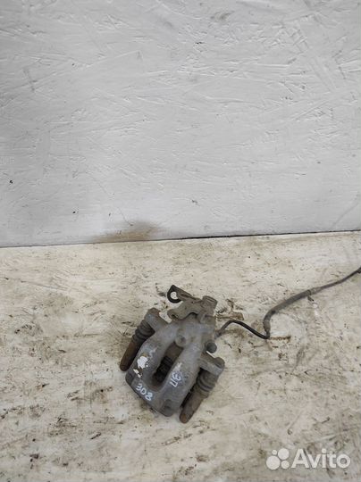 Суппорт тормозной задний правый Peugeot 308