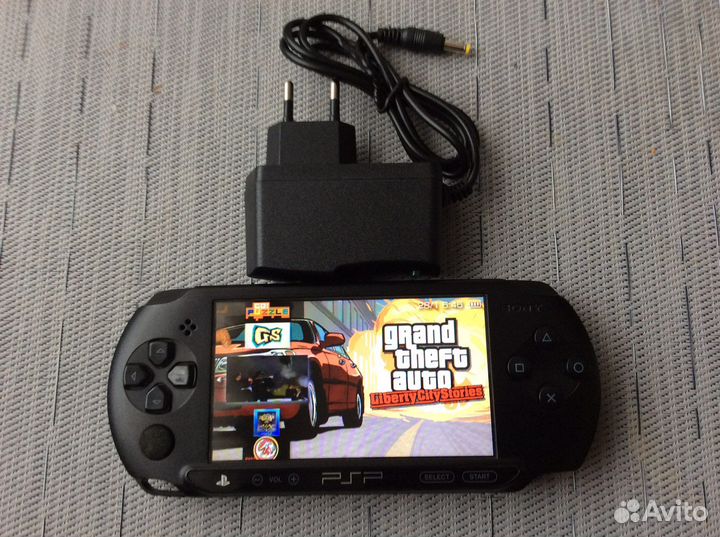 Sony PSP1008,прошита,карта на8Гб(76игр)