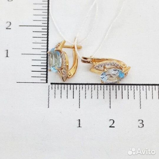 Золотые серьги с топазом