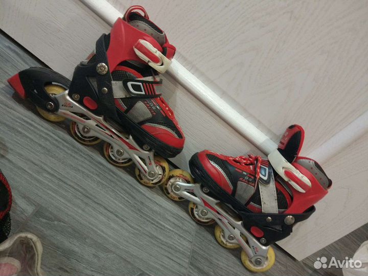 Роликовые коньки