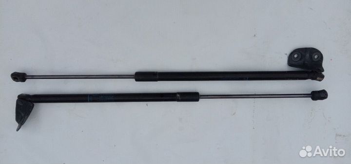 Амортизаторы крышки багажника Opel Astra j