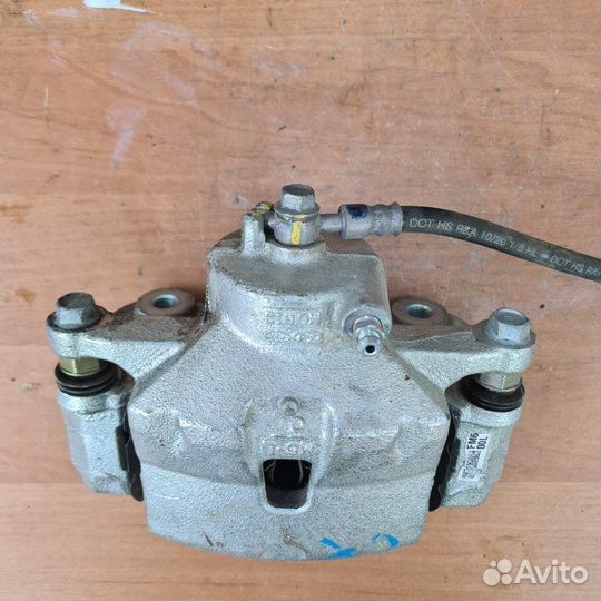 Суппорт тормозной передний левый Kia Cerato 4